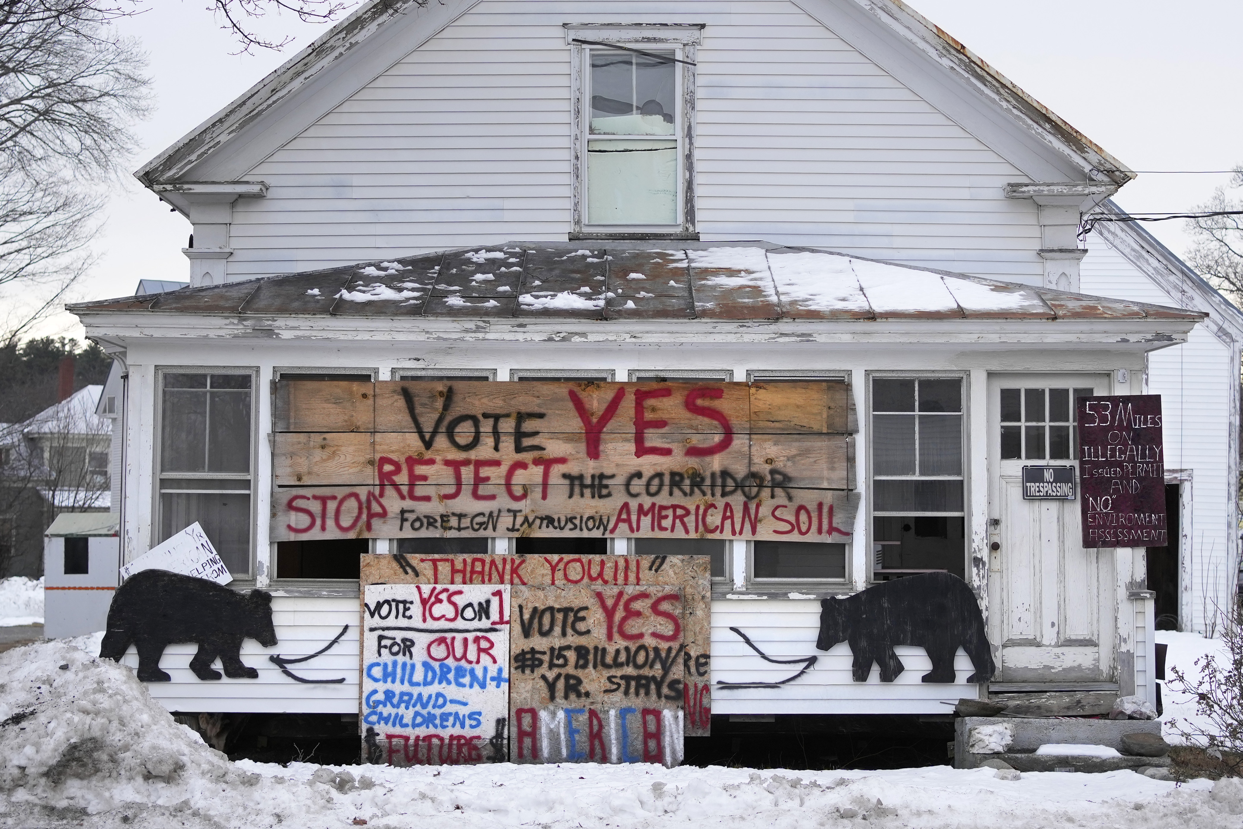 A home in Bingham, Maine, displays signs protesting the power line. A home in Bingham, Maine, displays signs protesting the power line.