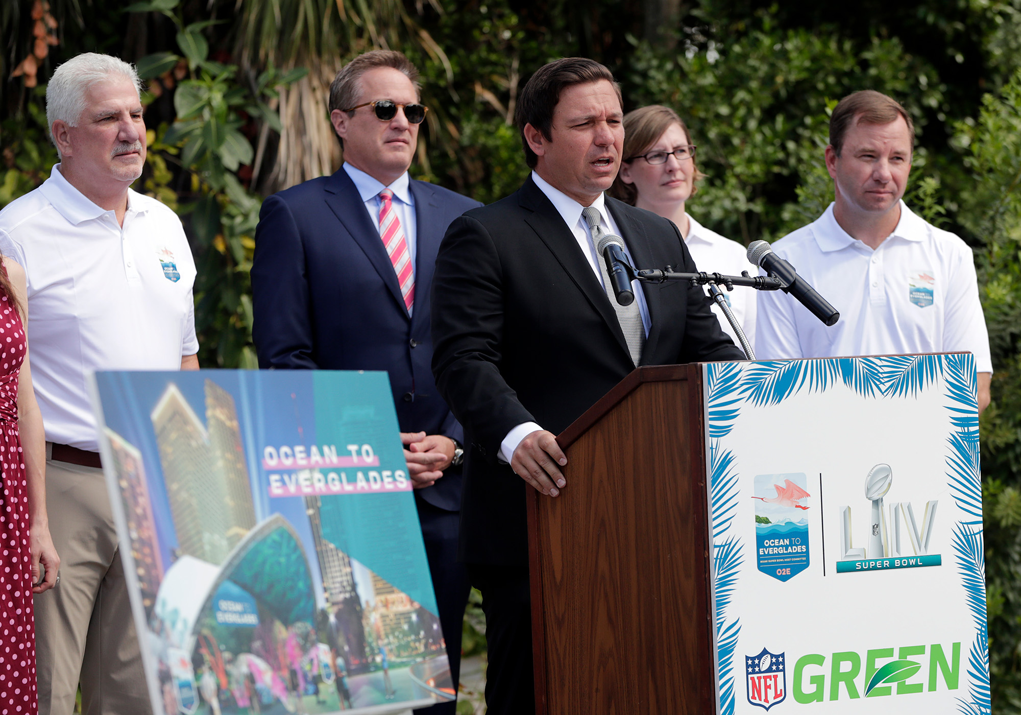 Florida Gov. Ron DeSantis (center) speaks during a news conference where the Miami Super Bowl Host Committee announced the launch of Ocean to Everglades, a Super Bowl LIV environmental initiative, at the Marjory Stoneman Douglas Biscayne Nature Center. Florida Gov. Ron DeSantis (center) speaks during a news conference where the Miami Super Bowl Host Committee announced the launch of Ocean to Everglades, a Super Bowl LIV environmental initiative, at the Marjory Stoneman Douglas Biscayne Nature Center.