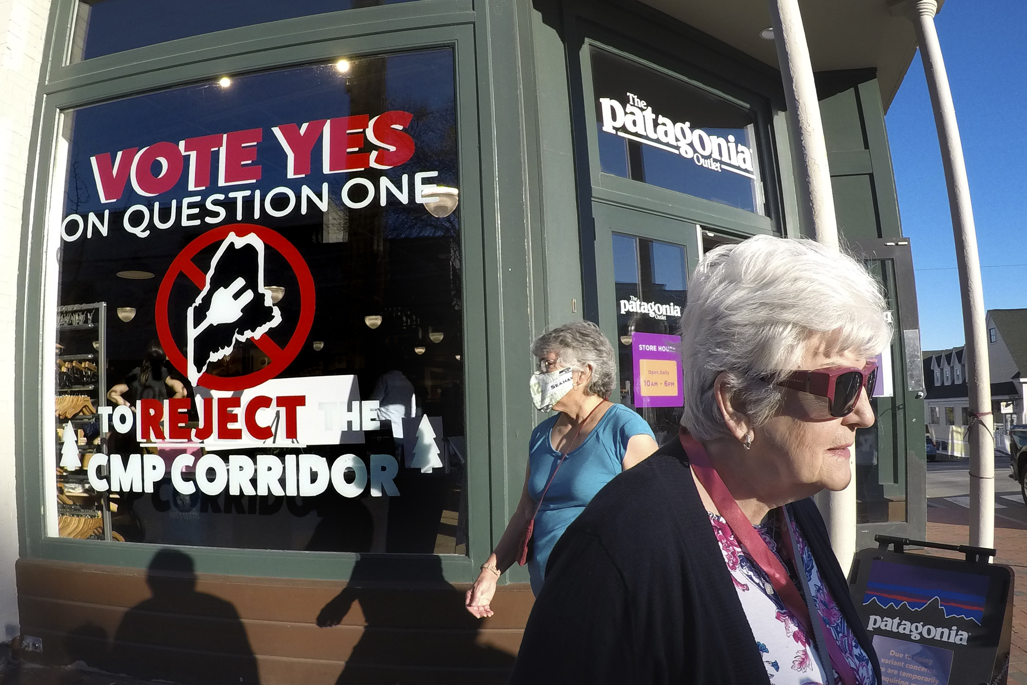 A painted window sign expresses opposition to a proposed 145-mile transmission line to bring Canadian hydropower into New England/ A painted window sign expresses opposition to a proposed 145-mile transmission line to bring Canadian hydropower into New England/