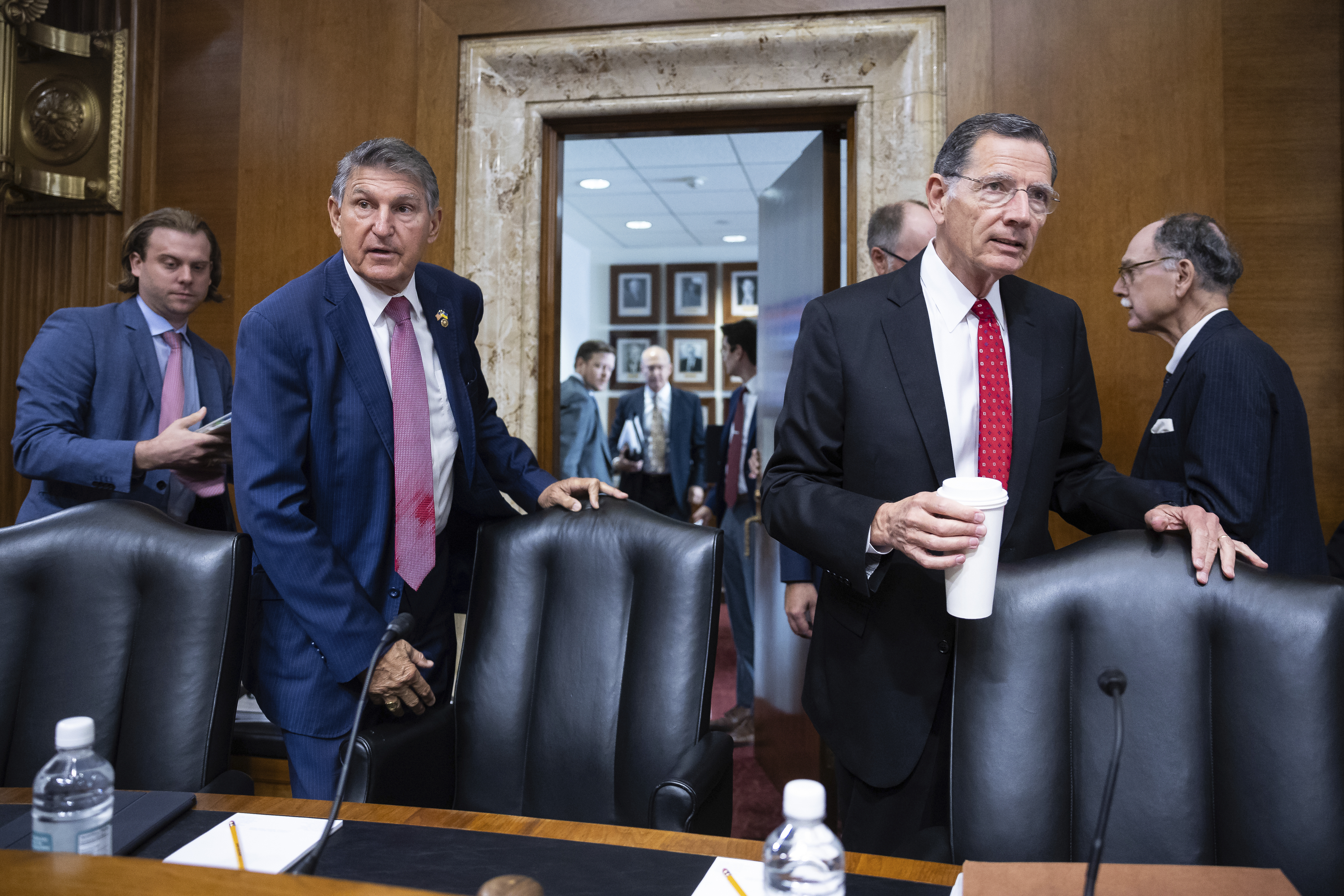 Sens. Joe Manchin (D-W.Va.) and John Barrasso (R-Wyo.). Sens. Joe Manchin (D-W.Va.) and John Barrasso (R-Wyo.).